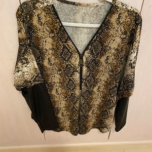 Lose fitting blouse, excellent condition.